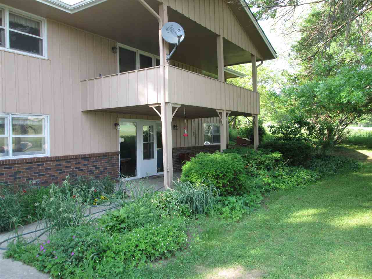 10217 Yale Bridge Road Rockton, IL 61072 - Photo 2 of 25 a house view with a garden space