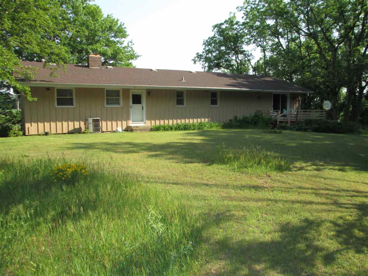 10217 Yale Bridge Road Rockton, IL 61072 - Photo 22 of 25 a front view of a house with a garden