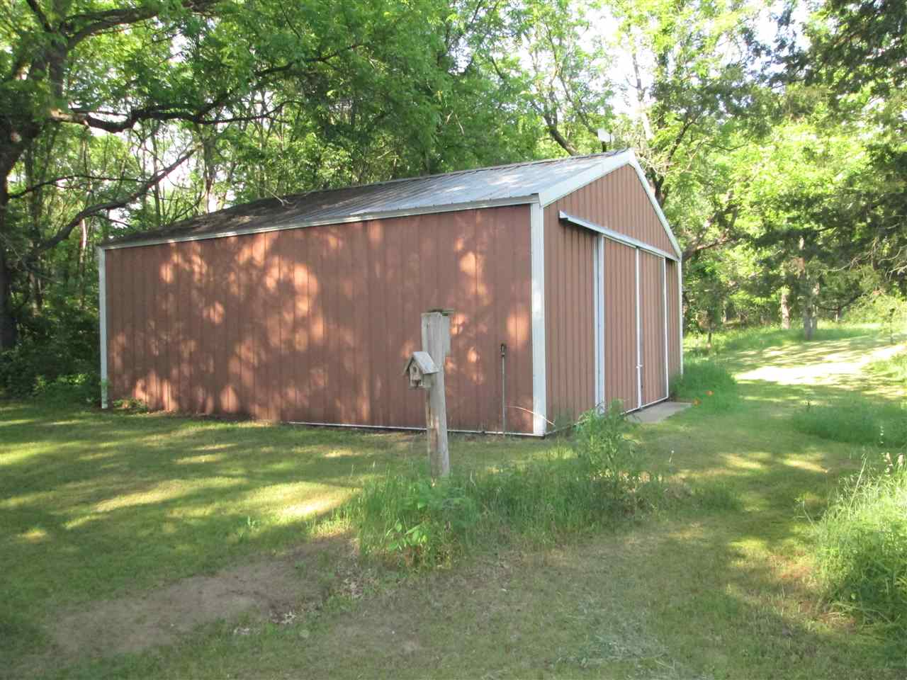 10217 Yale Bridge Road Rockton, IL 61072 - Photo 25 of 25 a backyard with garden