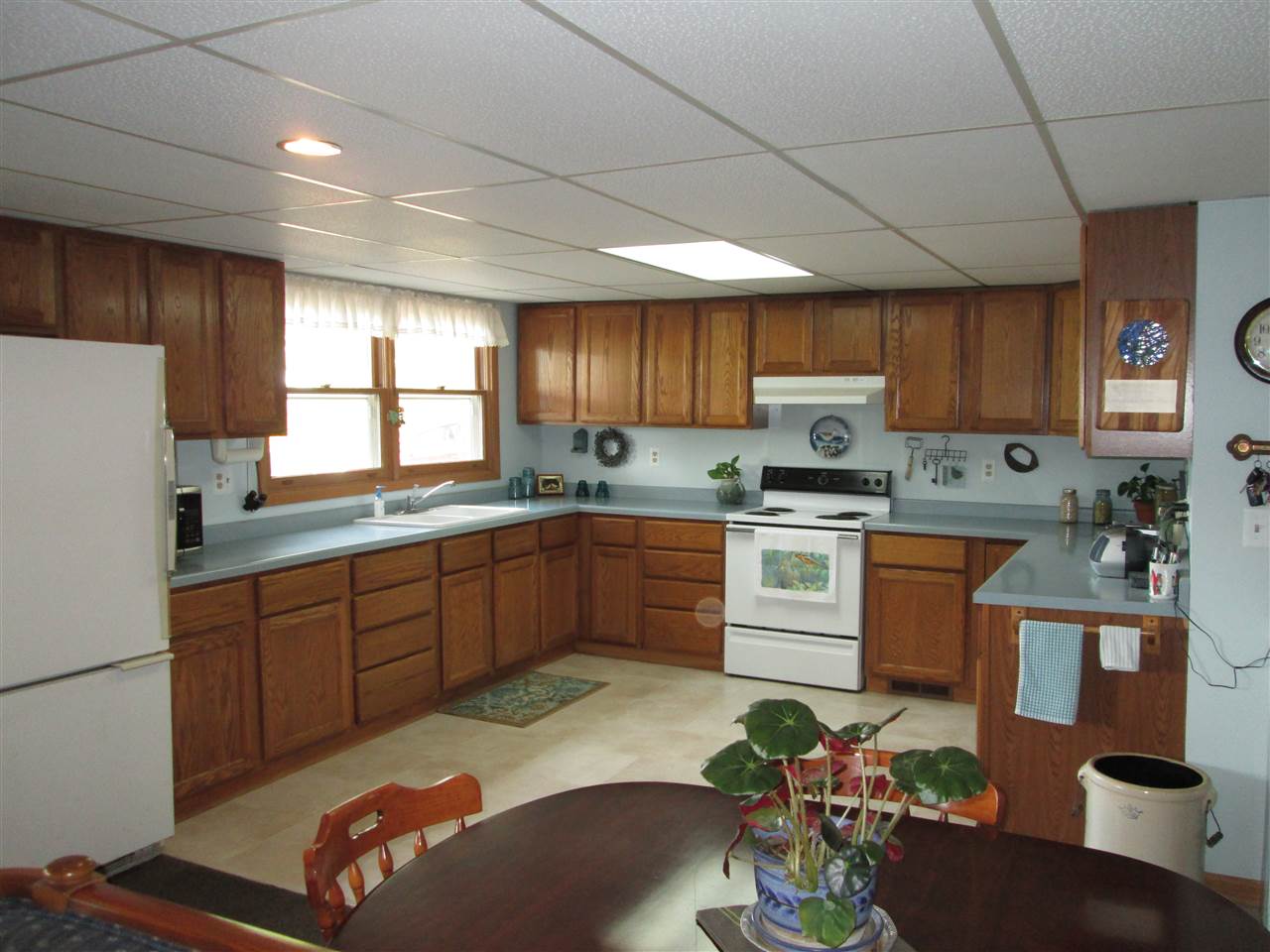 10217 Yale Bridge Road Rockton, IL 61072 - Photo 3 of 25 a kitchen with stainless steel appliances granite countertop a sink dishwasher stove and refrigerator