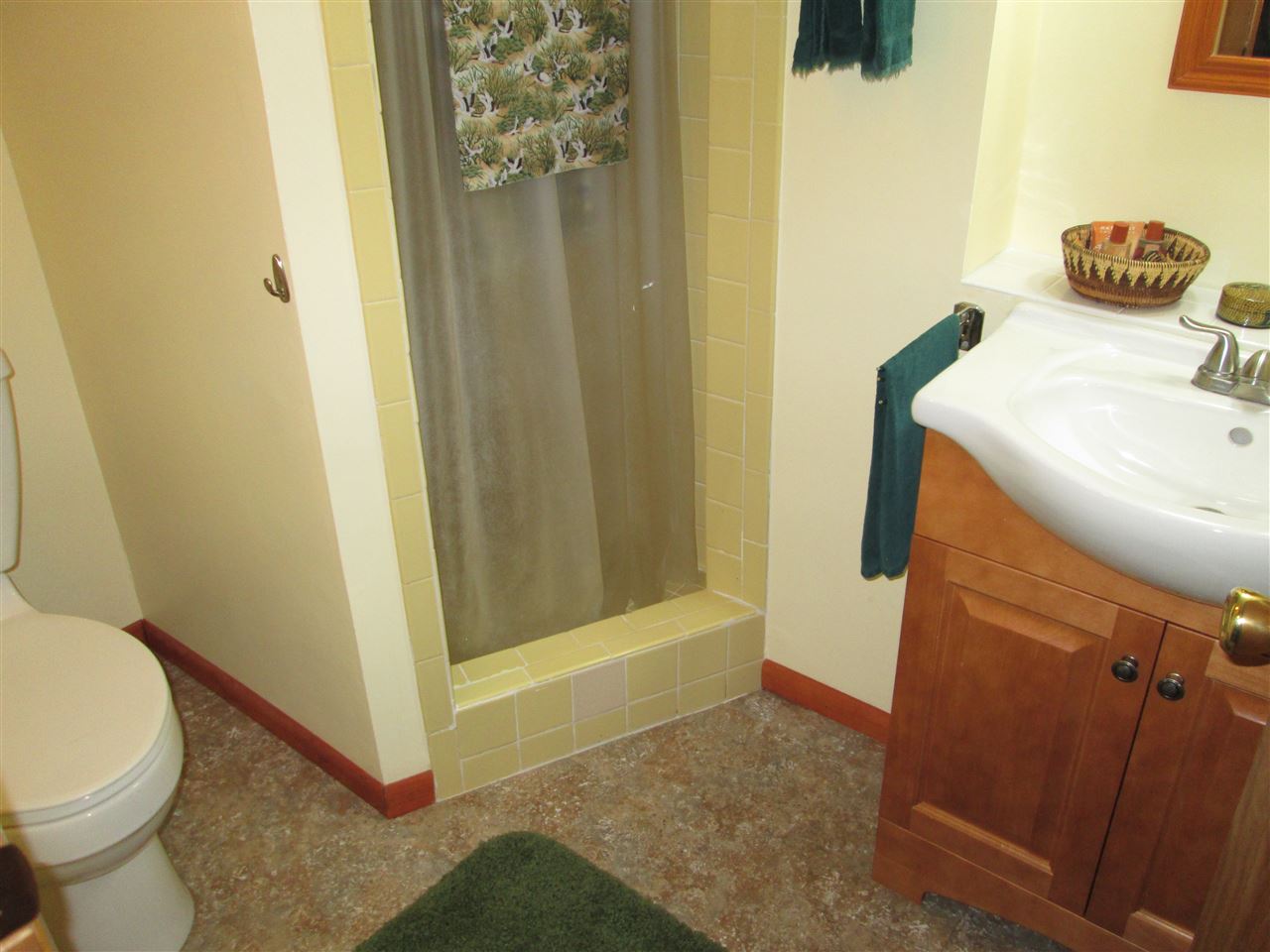 10217 Yale Bridge Road Rockton, IL 61072 - Photo 6 of 25 a bathroom with a sink and a mirror