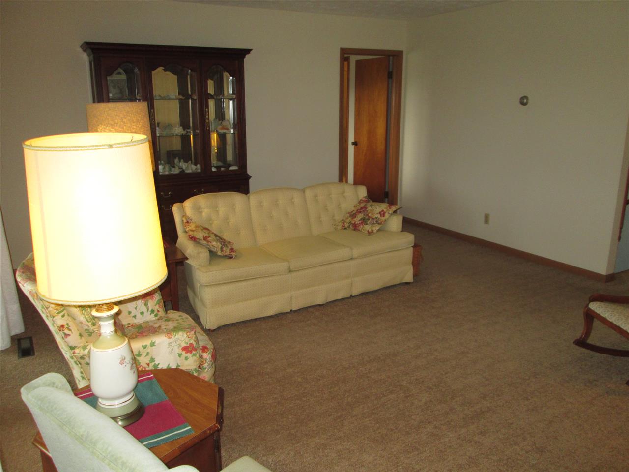 10217 Yale Bridge Road Rockton, IL 61072 - Photo 7 of 25 a living room with furniture and a window