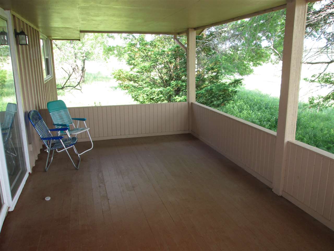 10217 Yale Bridge Road Rockton, IL 61072 - Photo 9 of 25 a view of a room with wooden floor and lounge chair