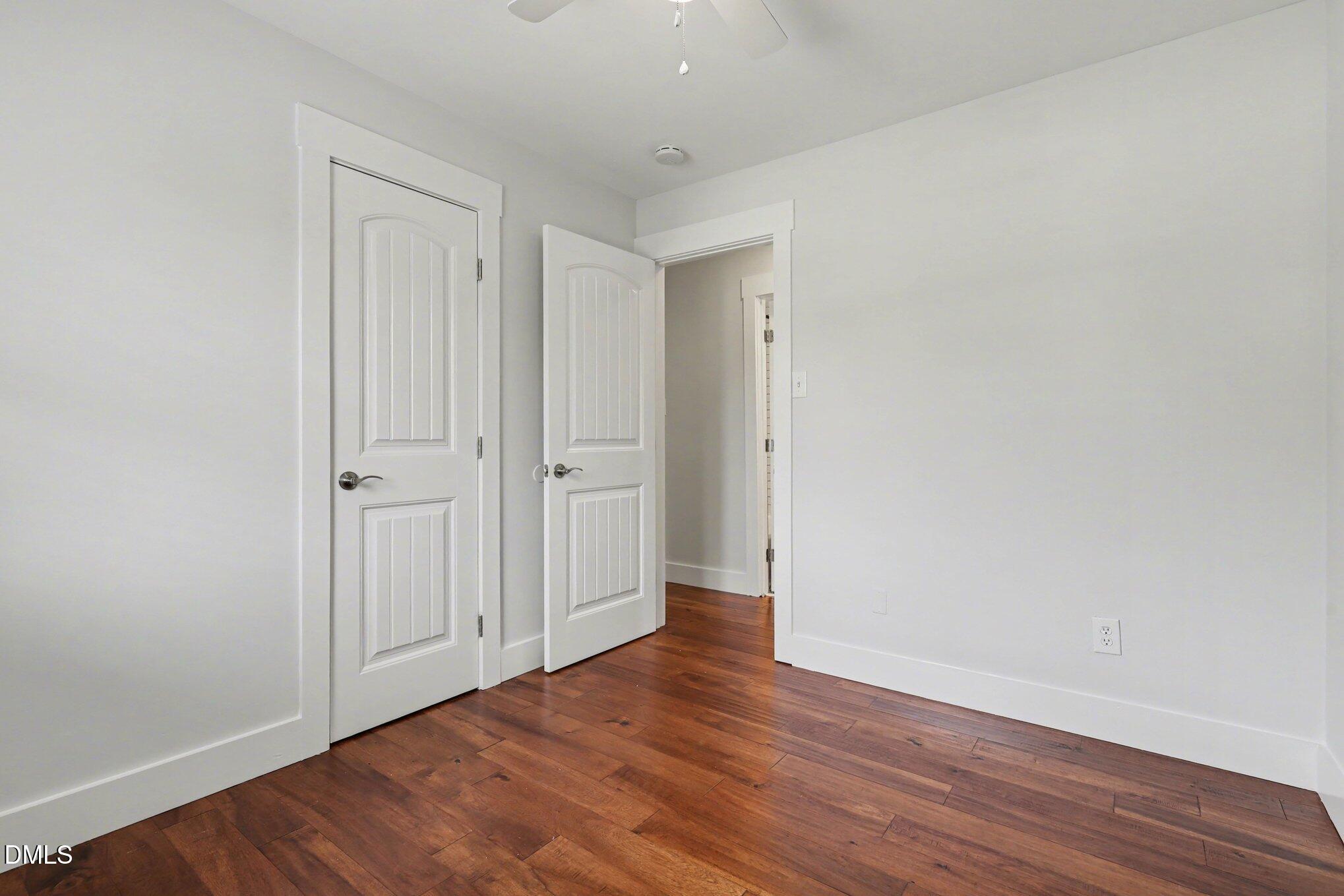 727 South State Street Raleigh, NC 27601 - Photo 13 of 30 a view of an empty room with wooden floor