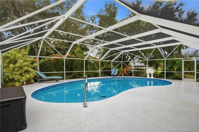 a view of a swimming pool with window