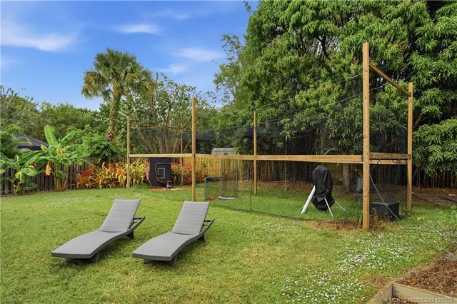 a view of a field with trees