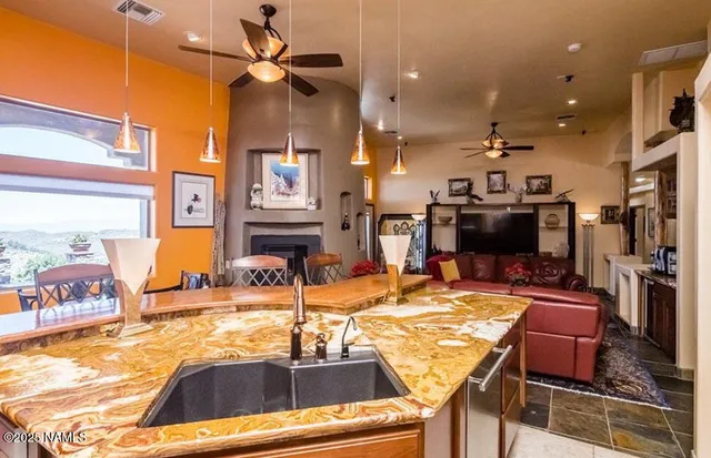 a kitchen with a table and chairs in it
