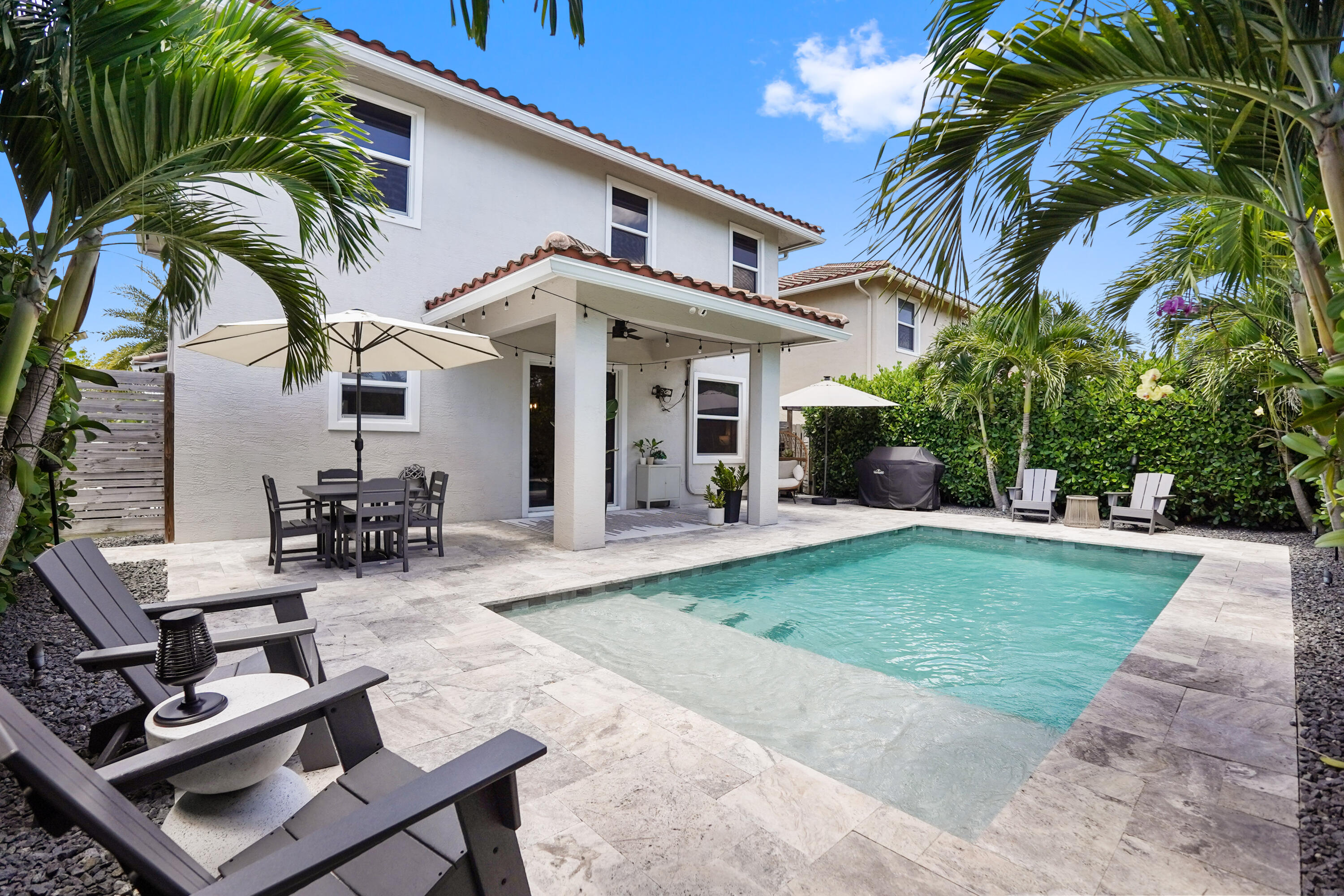 3914 La Rambla Greenacres, FL 33467 - Photo 2 of 43 a view of a house with backyard and sitting area