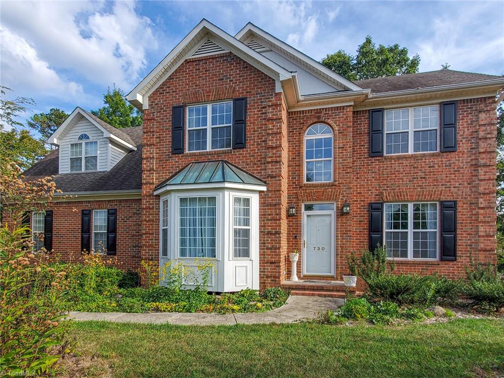 Classic curb appeal in this all brick home