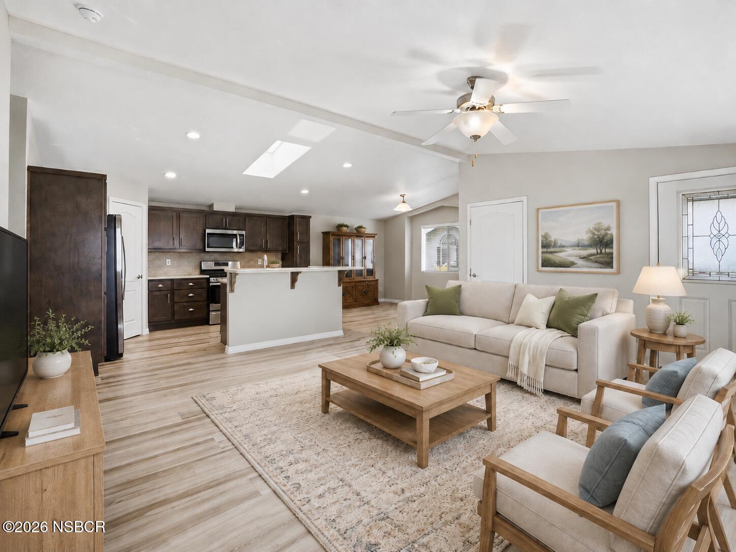 500 Atascadero Road, Unit M3 Morro Bay, CA 93442 - Photo 5 of 29 a living room with furniture and kitchen view