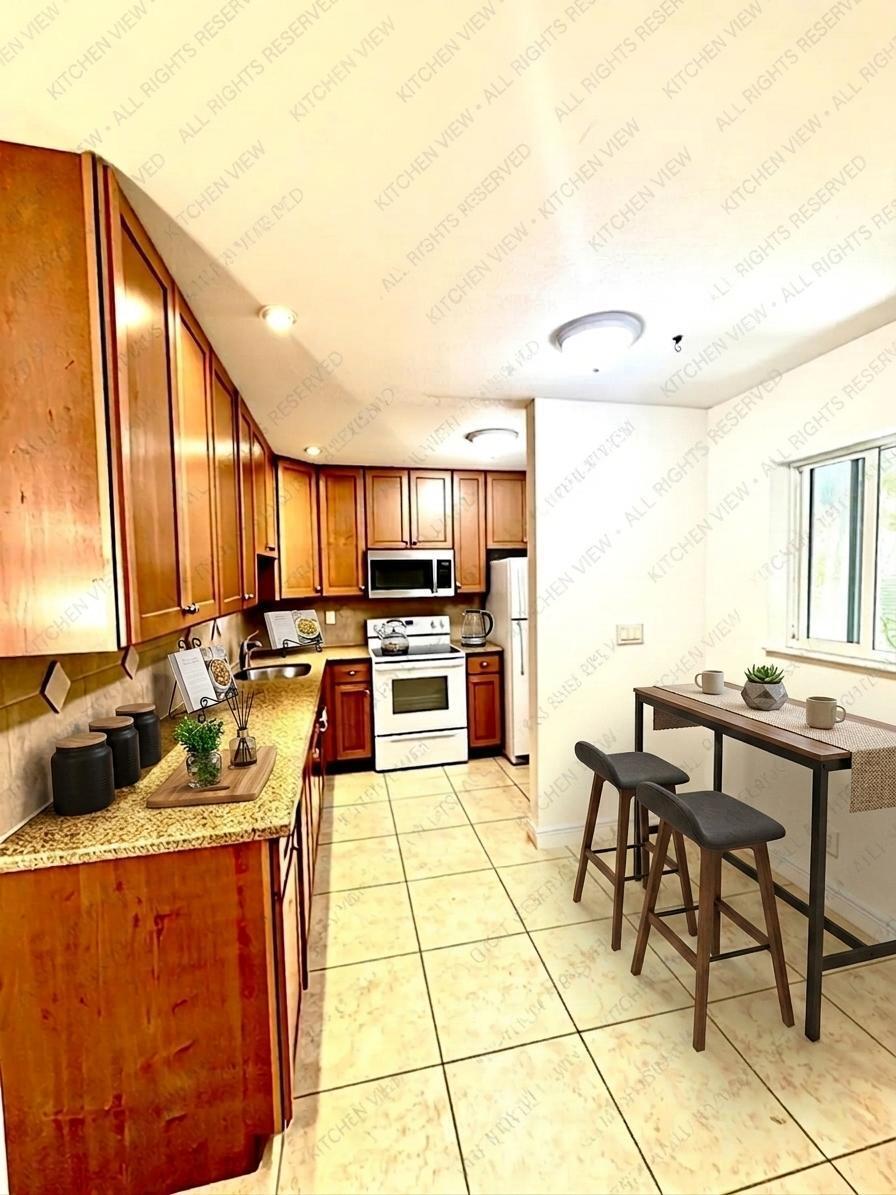 199 East McNab Road, Unit 109 Pompano Beach, FL 33060 - Photo 2 of 17 a kitchen with stainless steel appliances kitchen island granite countertop a sink and cabinets