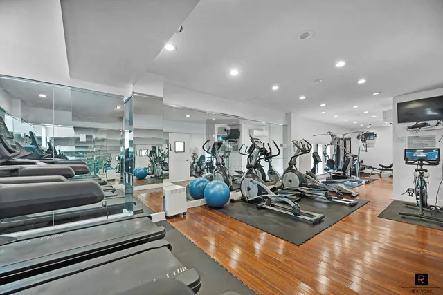 a view of a room with gym equipment