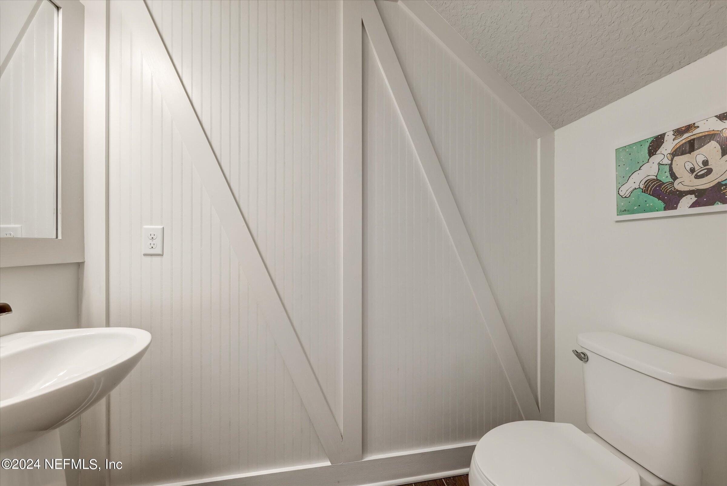 75 Bronson Parkway St. Augustine, FL 32095 - Photo 18 of 55 a bathroom with a sink and a mirror