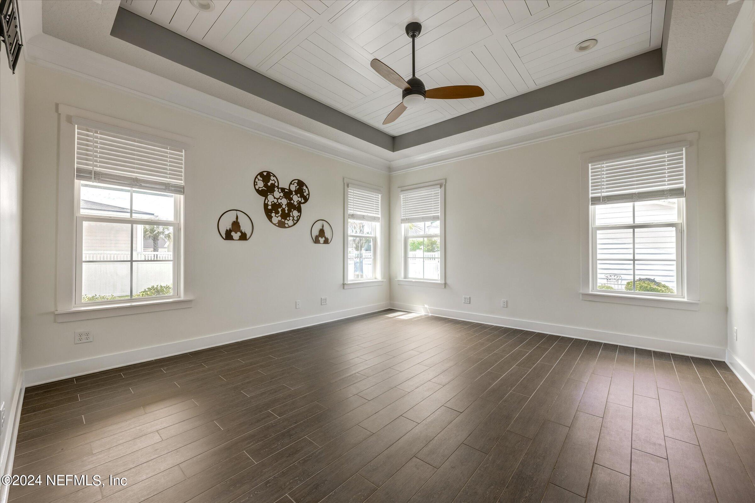 75 Bronson Parkway St. Augustine, FL 32095 - Photo 20 of 55 a view of an empty room with wooden floor and a window