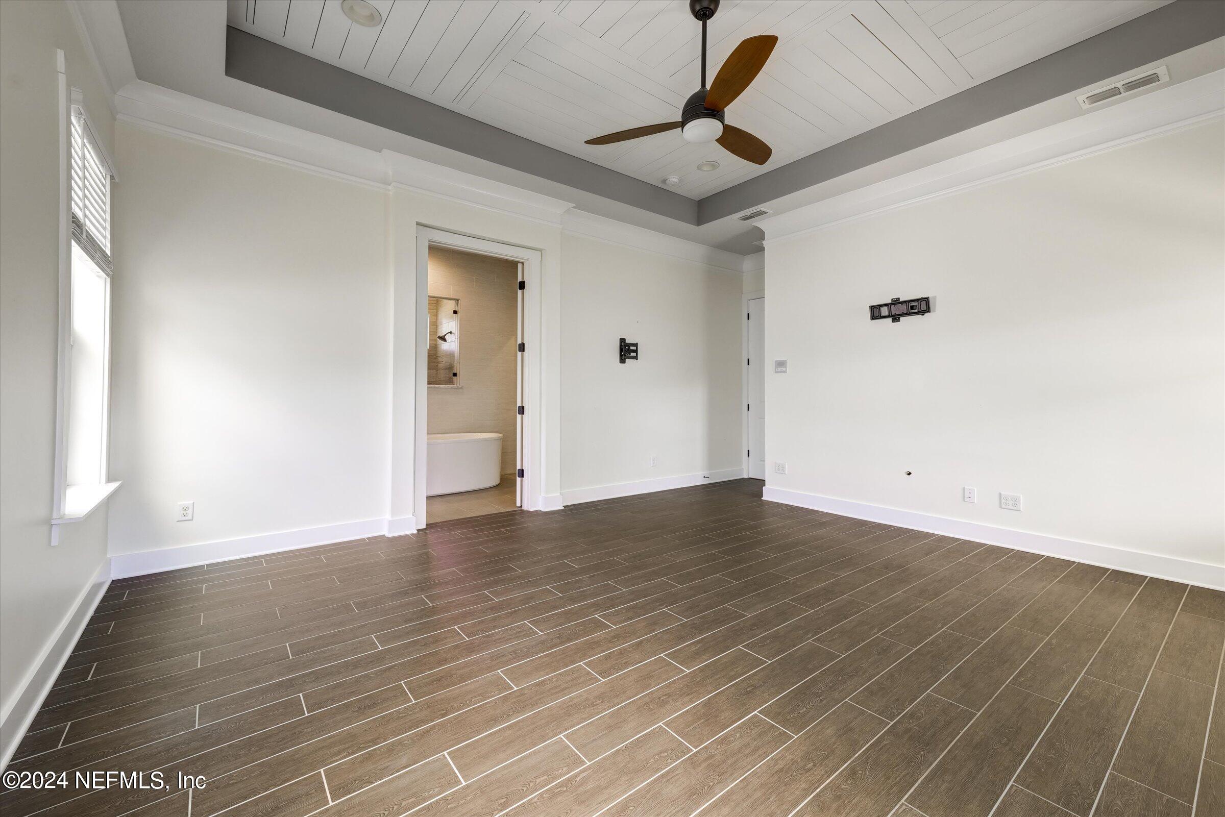 75 Bronson Parkway St. Augustine, FL 32095 - Photo 22 of 55 a view of empty room with wooden floor and fan