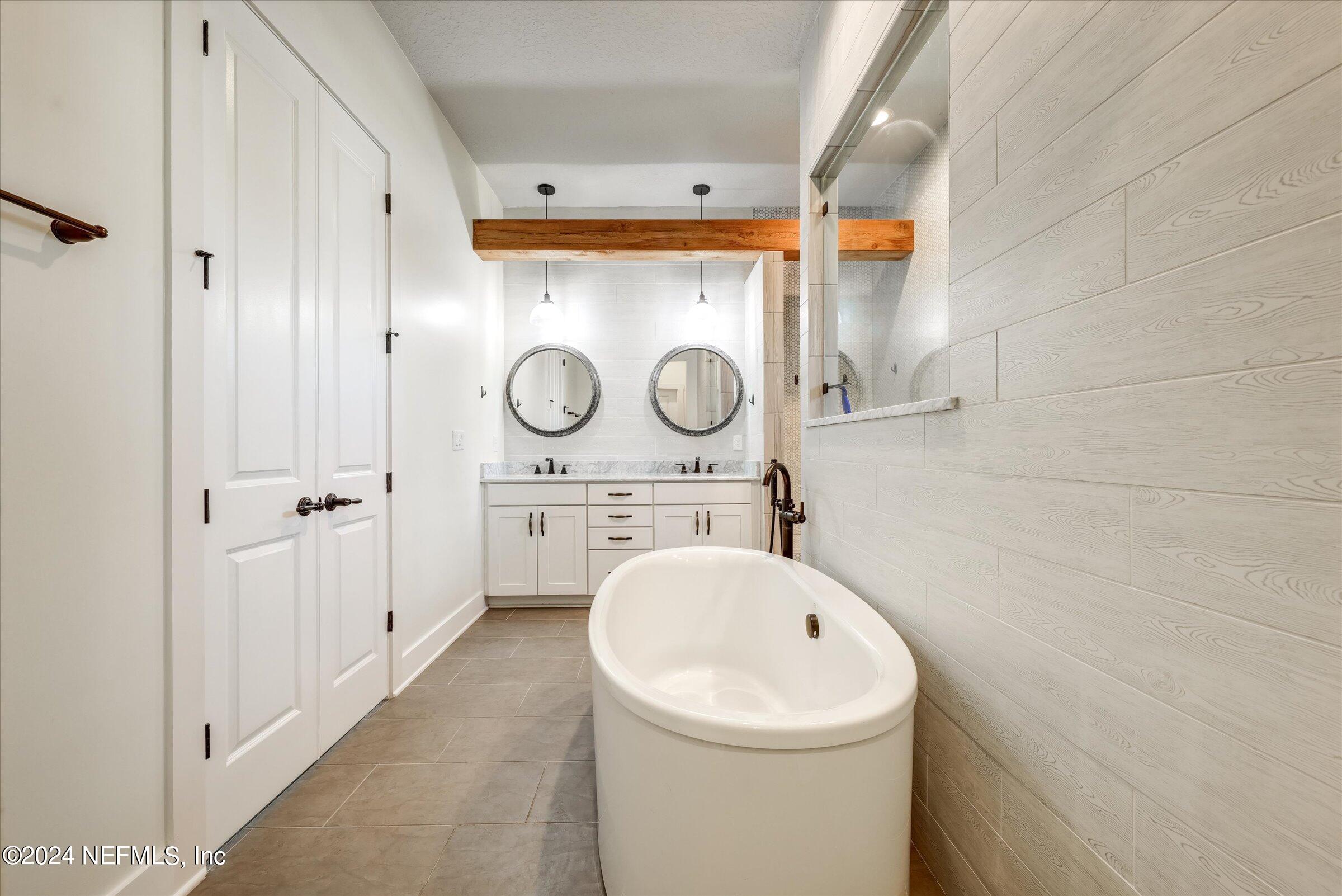 75 Bronson Parkway St. Augustine, FL 32095 - Photo 23 of 55 a close view of a utility room with dryer and washer