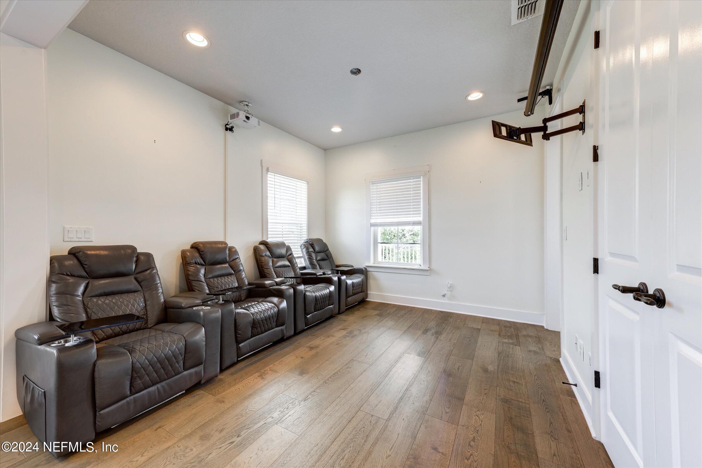 75 Bronson Parkway St. Augustine, FL 32095 - Photo 30 of 55 a living room with furniture and a wooden floor