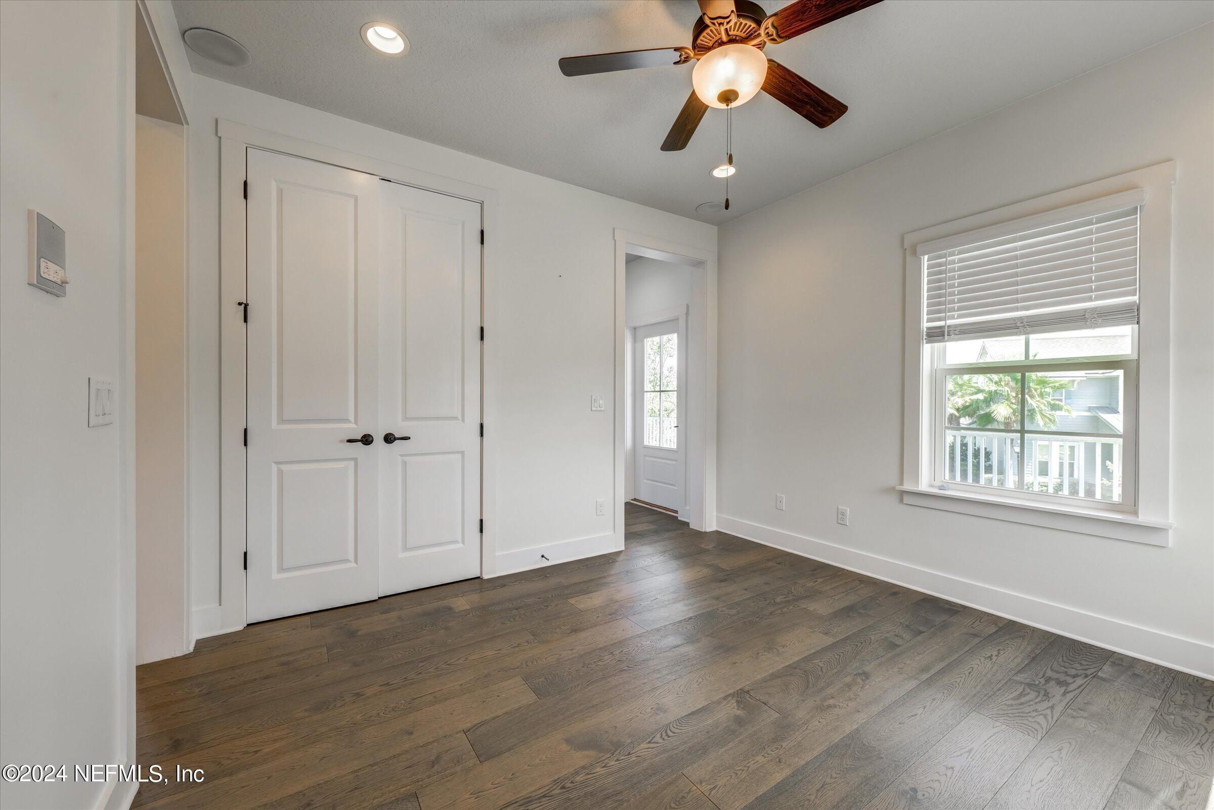 75 Bronson Parkway St. Augustine, FL 32095 - Photo 37 of 55 a view of an empty room with a window and a ceiling fan