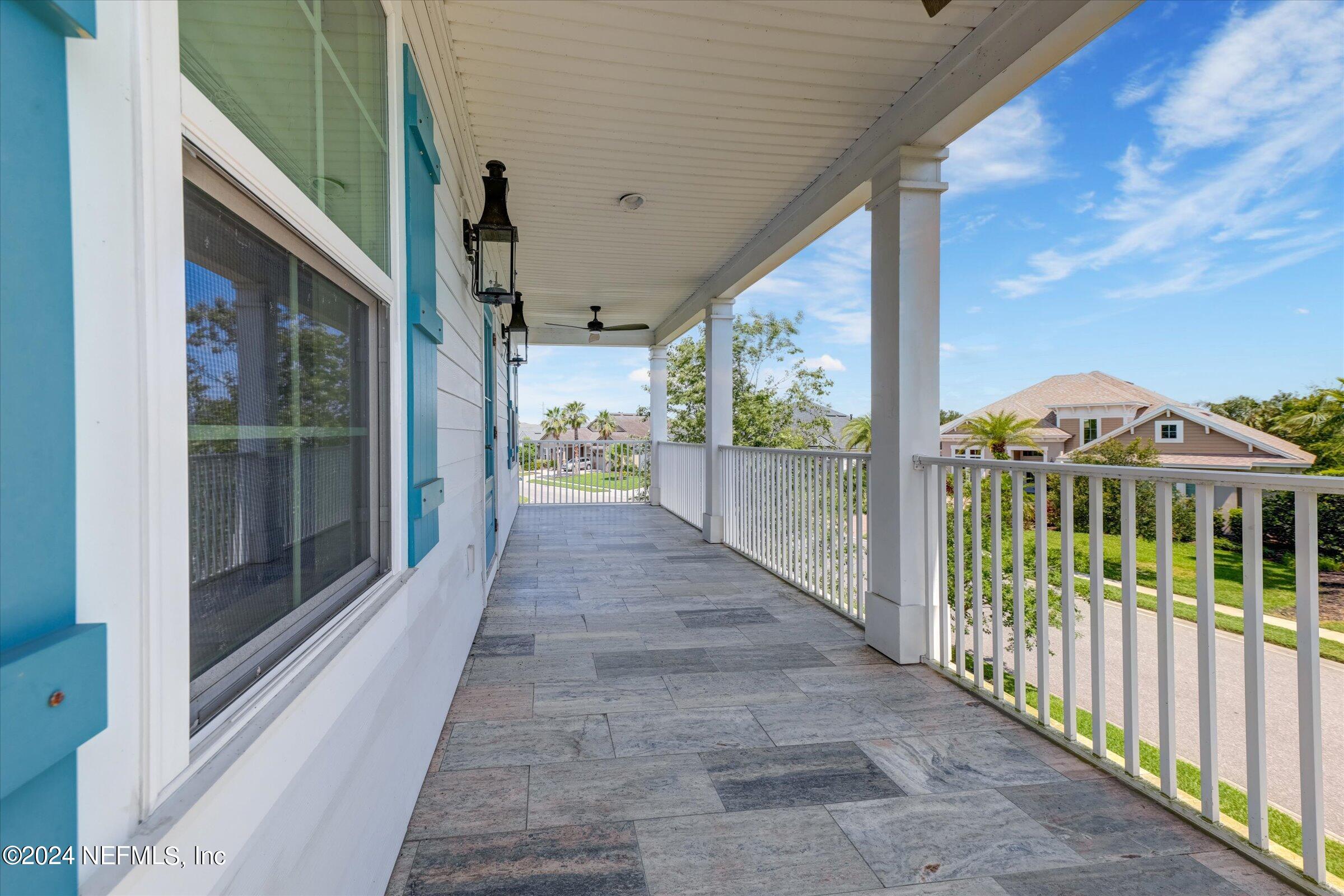 75 Bronson Parkway St. Augustine, FL 32095 - Photo 40 of 55 a view of a porch with wooden floor and stairs