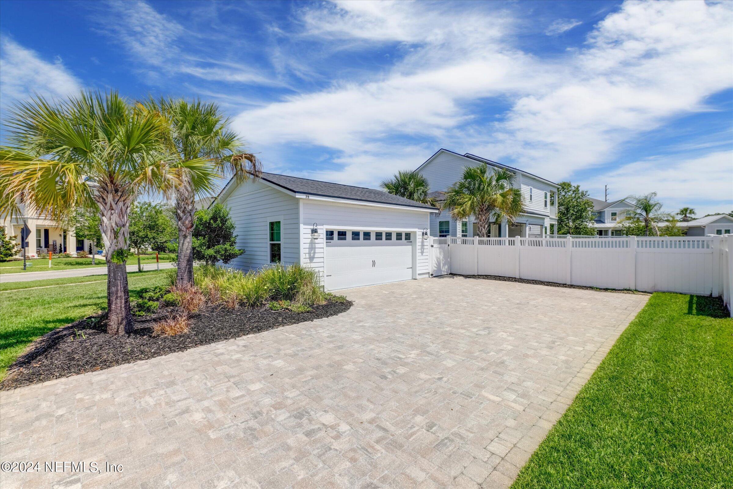 75 Bronson Parkway St. Augustine, FL 32095 - Photo 54 of 55 a view of a house with a yard