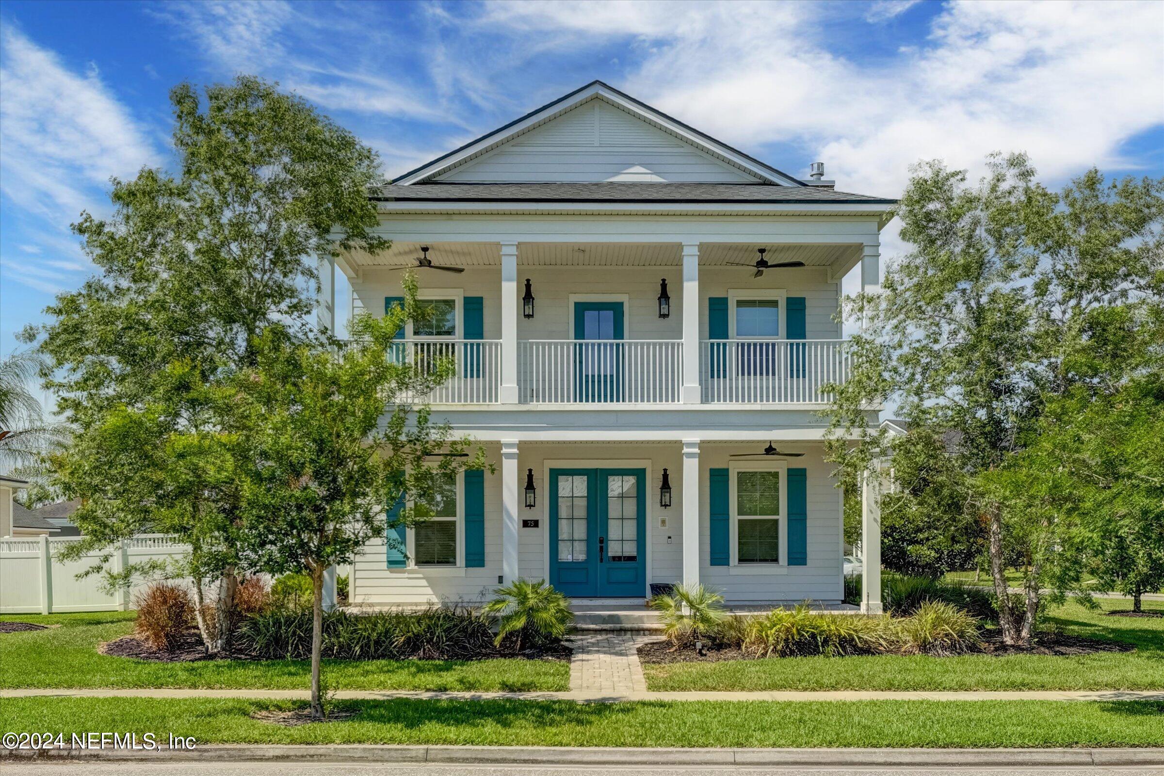 75 Bronson Parkway St. Augustine, FL 32095 - Photo 6 of 55 a front view of a house with a yard