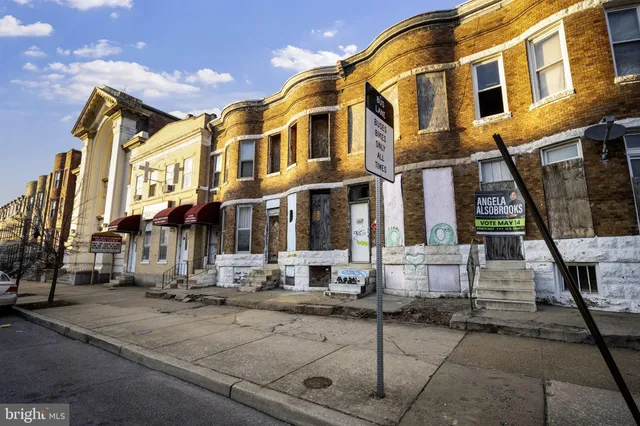 a view of a building with a street