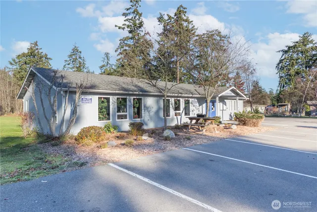 a view of an outdoor space and tennis court
