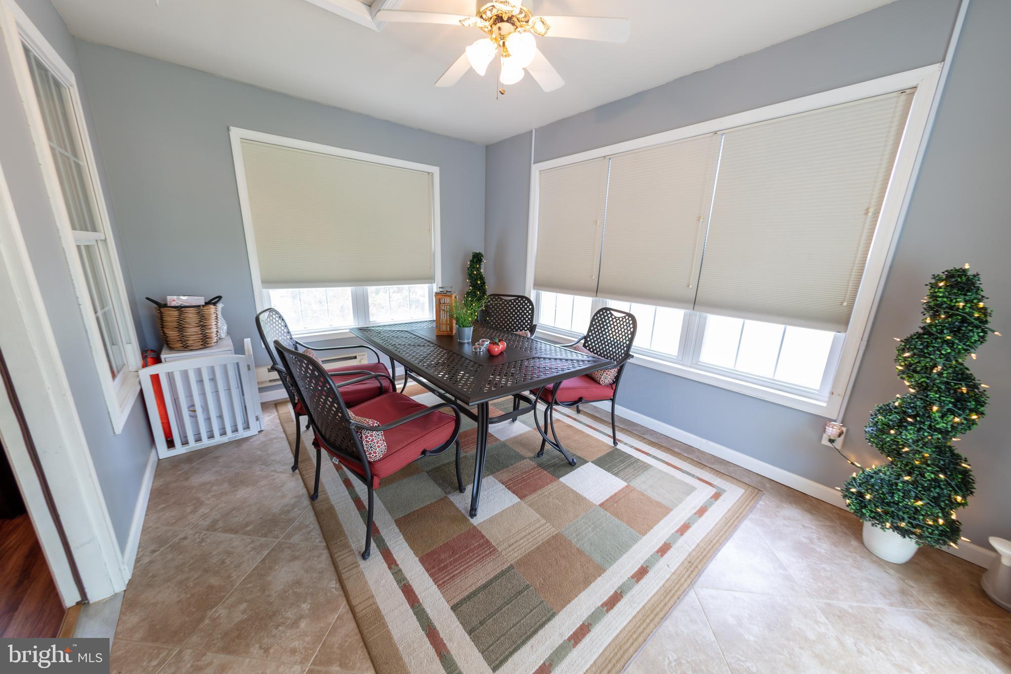 104 Rex Drive Ranson, WV 25438 - Photo 17 of 43 Sunroom
