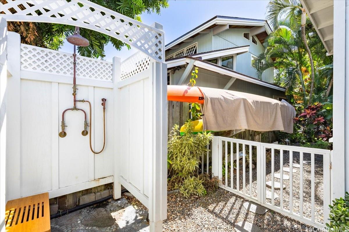465 Kawailoa Road, Unit C Kailua, HI 96734 - Photo 22 of 25 Enjoy the private deluxe hot/cold outdoor shower after a day at the beach. Note the canoe/kayak/surfboard storage area