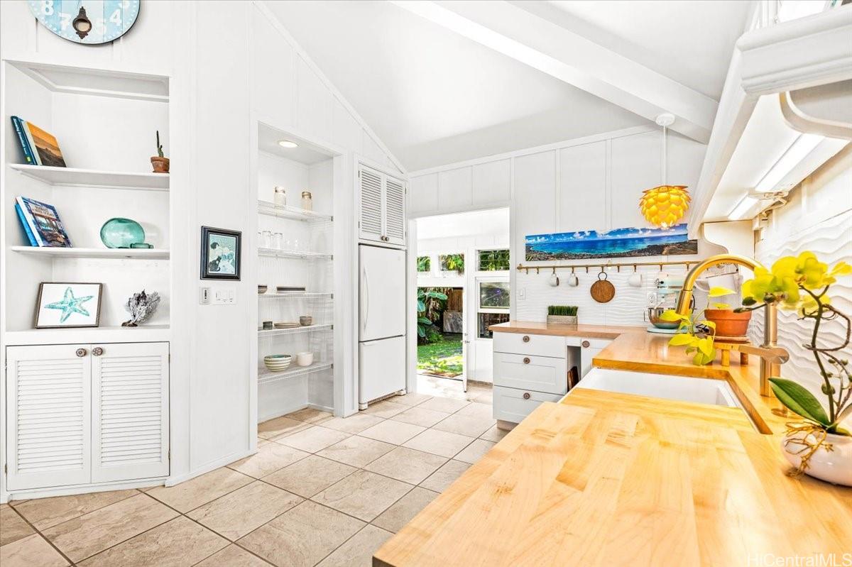 465 Kawailoa Road, Unit C Kailua, HI 96734 - Photo 5 of 25 Wonderful remodeled kitchen with built ins and lots of cabinet/drawer space