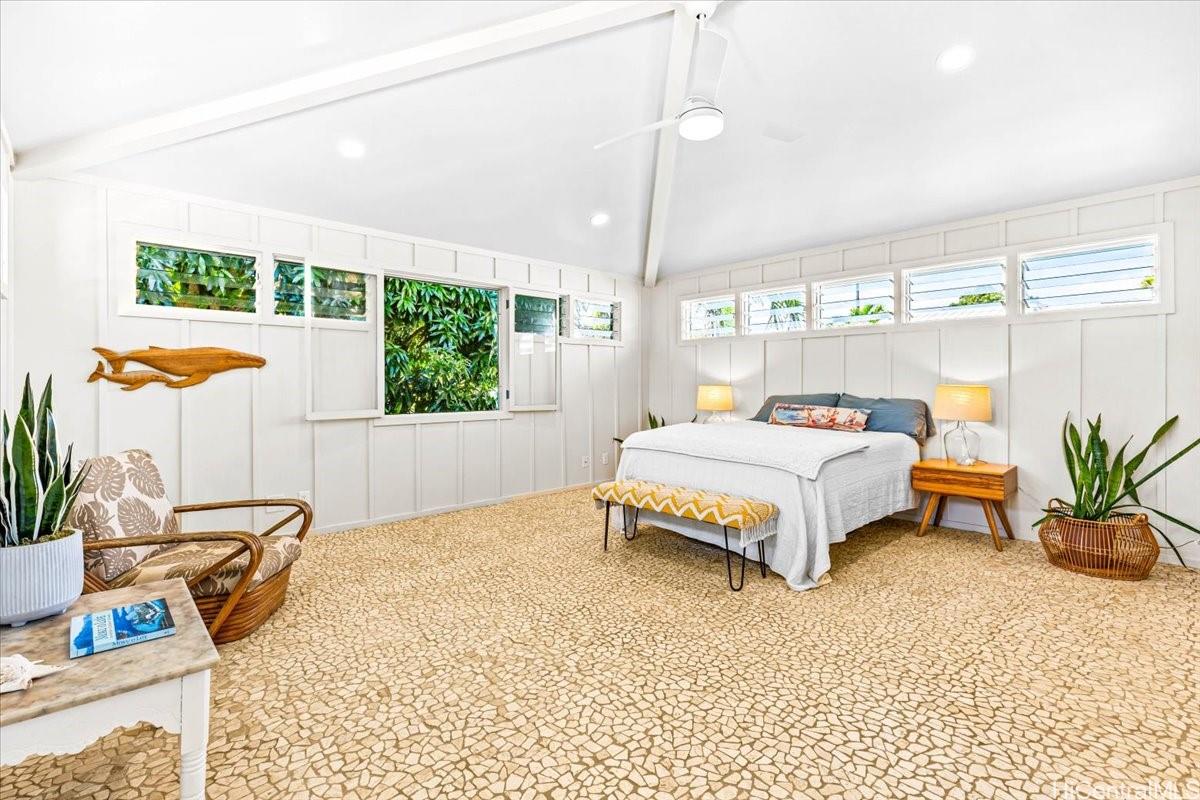 465 Kawailoa Road, Unit C Kailua, HI 96734 - Photo 7 of 25 Stunning huge bright airy primary bedroom with treetop view