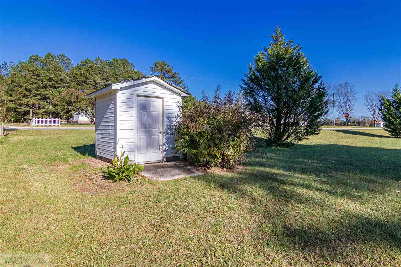 952 Woodruff Road Selma, NC 27576 - Photo 28 of 30 Well house used for outside irrigation