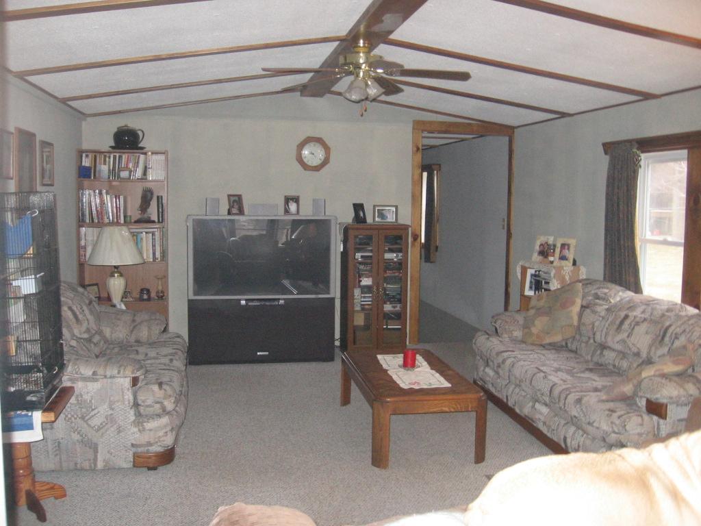 220 Hawk Farm Road Kunkletown, PA 18058 - Photo 5 of 10 a living room with furniture and a rug