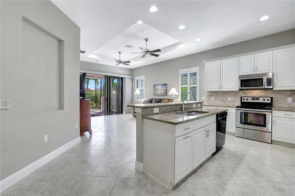 a kitchen with a stove and a microwave
