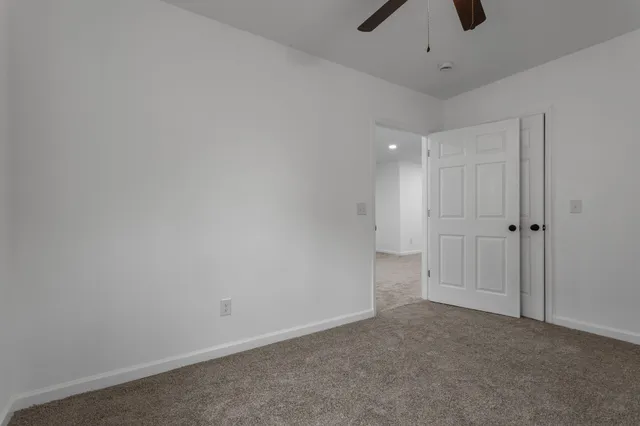 a bathroom with a sink a toilet and bathtub