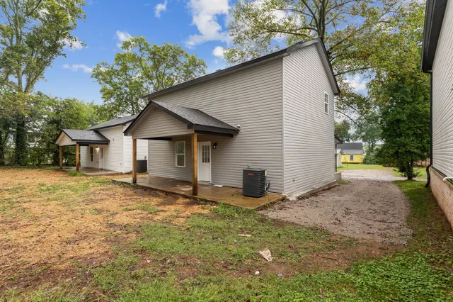 a view of a porch with wooden floor