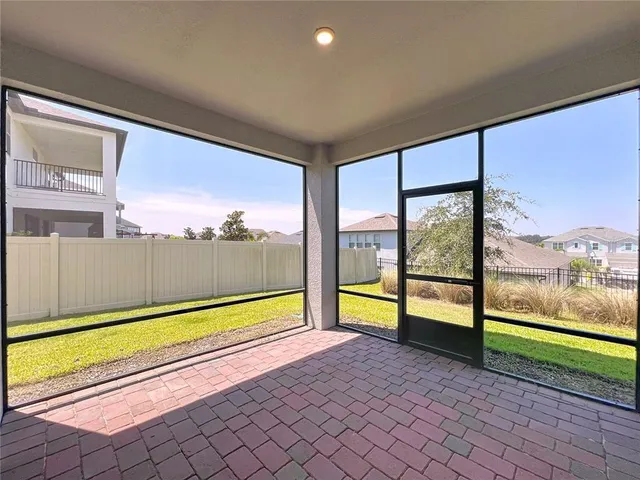 a view of a bathroom from a hallway