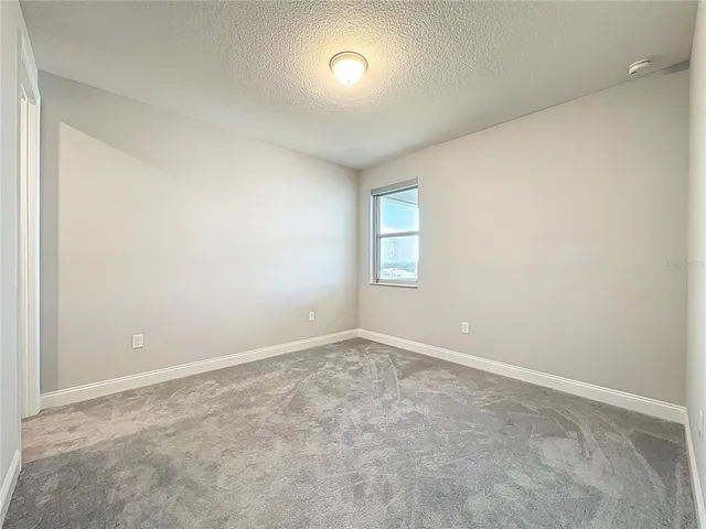 a view of livingroom with washer and dryer
