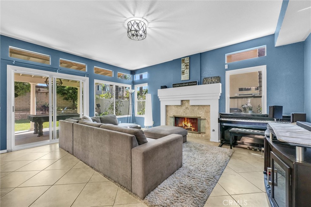 7437 Red Clover Way Highland, CA 92346 - Photo 12 of 33 Family Room with cozy Fireplace