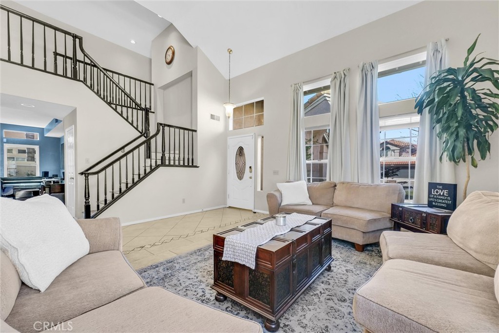 7437 Red Clover Way Highland, CA 92346 - Photo 4 of 33 Side view of Living room showing stair way