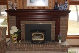 275 Mack Road Leonard, MI 48367 - Photo 14 of 34 Fireplace.jpg