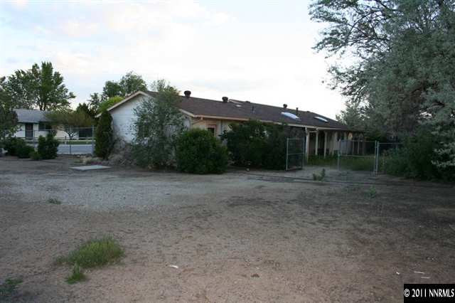 698 Empire Road Dayton, NV 89403 - Photo 11 of 12 a view of a house with a yard