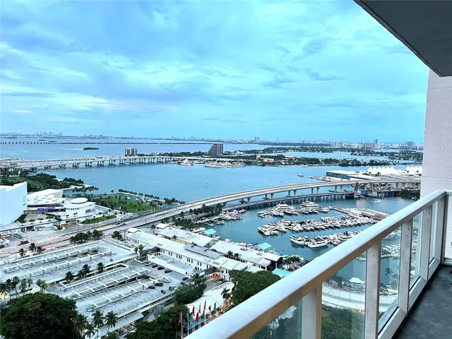 a view of a city skyline from a balcony