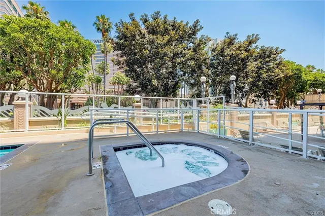 a view of a swimming pool with a patio