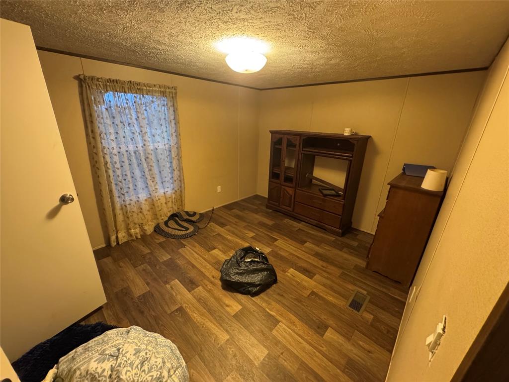 949-c C C C Sandidge Road Elm Grove, LA 71051 - Photo 2 of 9 a living room with a fireplace