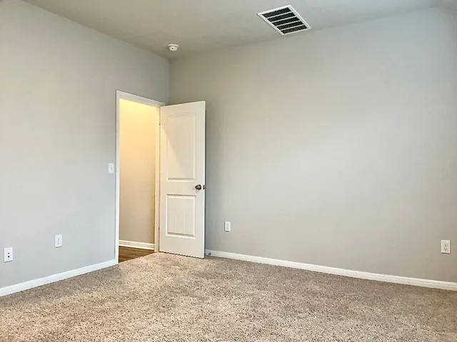 a view of a kitchen with electric appliances
