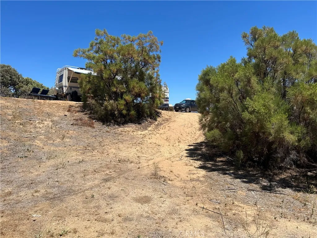 38111 Manzanita Road Anza, CA 92539 - Photo 11 of 25 a view of a yard covered with snow in front of house