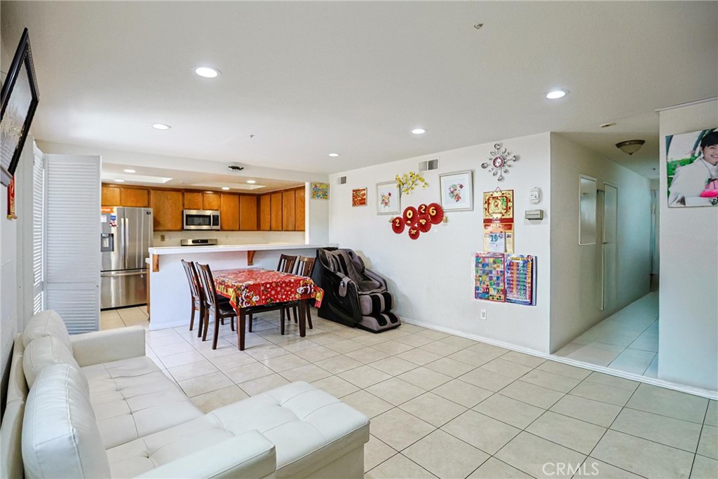 7912 2nd Street, Unit 4 Stanton, CA 90680 - Photo 2 of 16 a view of a livingroom with furniture and a couch