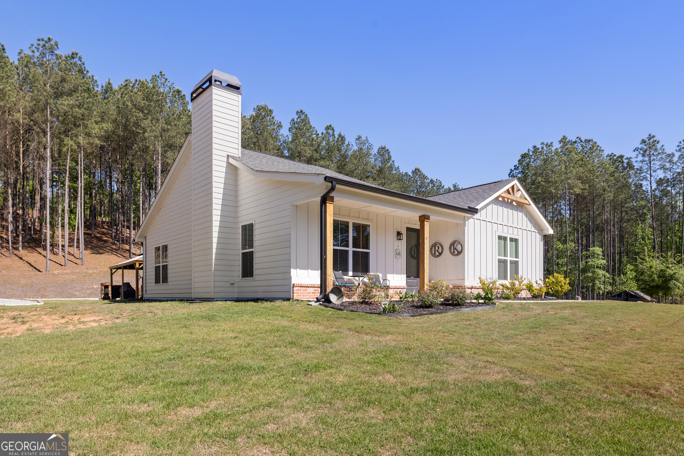843 Millen Road Monticello, GA 31064 - Photo 1 of 1 a front view of a house with a yard