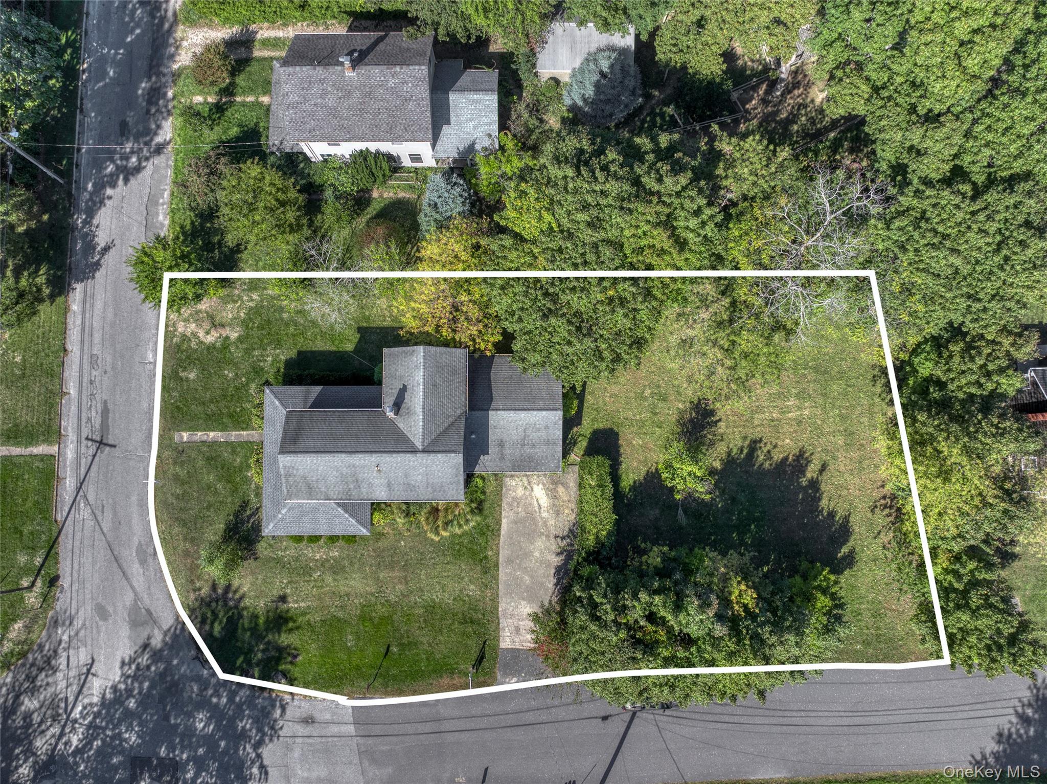 385 Cottage Place Southold, NY 11971 - Photo 2 of 14 an aerial view of a house